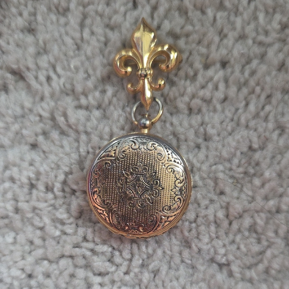 Elegant Gold and Silver Pendant